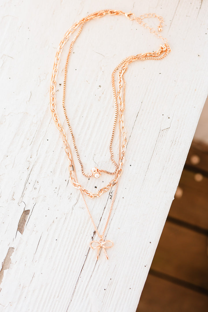 Rory Multi Layer Pearl Bow Charm Necklace