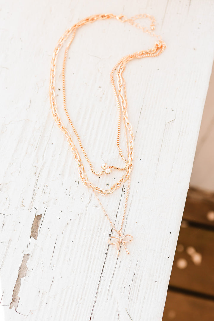 Rory Multi Layer Pearl Bow Charm Necklace